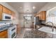 Well-lit kitchen with breakfast nook and modern appliances at 8266 Lincoln Valley St, Las Vegas, NV 89123