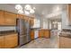Bright kitchen with stainless steel refrigerator and center island at 8266 Lincoln Valley St, Las Vegas, NV 89123