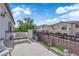 Large balcony overlooking the surrounding neighborhood on a sunny day at 8268 Nelson Ridge Ln, Las Vegas, NV 89178