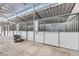 Bright horse barn interior with ample lighting and sturdy stall construction at 8440 La Cienega St, Las Vegas, NV 89123