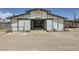 Horse barn with multiple stalls and open center aisle at 8440 La Cienega St, Las Vegas, NV 89123