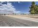 White fence and brick column surround this horse property at 8440 La Cienega St, Las Vegas, NV 89123