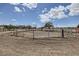 This property includes a spacious outdoor horse arena with metal fencing, ideal for equestrian activities at 8440 La Cienega St, Las Vegas, NV 89123