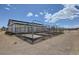 Outdoor horse paddock with sturdy metal fencing, offering a secure and spacious area for exercise at 8440 La Cienega St, Las Vegas, NV 89123