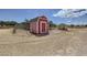 Rustic outbuilding with corral, providing storage and shelter, ideal for hobby farms or equestrian enthusiasts at 8440 La Cienega St, Las Vegas, NV 89123