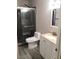 Bright bathroom featuring a shower, toilet, and a single vanity with a white cabinet at 8455 W Sahara Ave # 213, Las Vegas, NV 89117