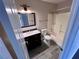 Bathroom with vanity, toilet, and shower/tub combo at 8455 W Sahara Ave # 213, Las Vegas, NV 89117