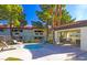 Community pool with lounge chairs and covered seating area offers a relaxing space at 8455 W Sahara Ave # 213, Las Vegas, NV 89117