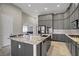 Gourmet kitchen featuring stainless appliances, granite countertops, and a kitchen island at 8544 Garden Valley Ct, Las Vegas, NV 89178