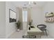 Office area with desk and decor, staged virtually at 8544 Garden Valley Ct, Las Vegas, NV 89178