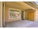 Covered outdoor patio area with stylish furniture and access to backyard, perfect for relaxing and entertaining guests at 8544 Garden Valley Ct, Las Vegas, NV 89178