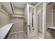 Walk-in closet features built-in shelving and adjoins the bathroom at 8544 Garden Valley Ct, Las Vegas, NV 89178