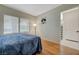 Comfortable bedroom with natural light, hardwood floors and plenty of space at 8591 Heather Downs Dr, Las Vegas, NV 89113