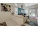 Inviting living room with large windows, stylish furnishings, and a cozy seating arrangement at 8591 Heather Downs Dr, Las Vegas, NV 89113