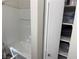 Bathroom with an enclosed shower and storage shelves for convenience at 8805 Jeffreys St # 1103, Las Vegas, NV 89123