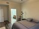 Bedroom featuring a bed, chair, and an ensuite bathroom at 8805 Jeffreys St # 1103, Las Vegas, NV 89123