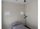 This bedroom includes luxury vinyl floors, a ceiling fan, and natural light at 8805 Jeffreys St # 1103, Las Vegas, NV 89123