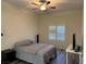 This bedroom features a ceiling fan and window with wood look flooring at 8805 Jeffreys St # 1103, Las Vegas, NV 89123