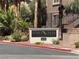 Pebble Creek Village sign at community entrance, surrounded by greenery at 8805 Jeffreys St # 1103, Las Vegas, NV 89123