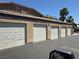 Row of garages offers ample parking and storage in a well-maintained community at 8805 Jeffreys St # 1103, Las Vegas, NV 89123