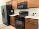 This kitchen offers stainless steel appliances and light-colored countertops at 8805 Jeffreys St # 1103, Las Vegas, NV 89123