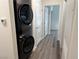 This laundry room includes a washer/dryer and luxury vinyl flooring at 8805 Jeffreys St # 1103, Las Vegas, NV 89123