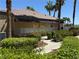 Community mailbox area surrounded by lush landscaping, providing privacy at 8805 Jeffreys St # 1103, Las Vegas, NV 89123