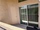 Outdoor patio with sliding glass doors providing natural light and exterior access at 8805 Jeffreys St # 1103, Las Vegas, NV 89123