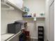 Organized walk-in closet with shelves and storage for optimal use of space at 8805 Jeffreys St # 1103, Las Vegas, NV 89123