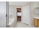 Bathroom with shower, tub, and view of bedroom at 8913 Loggers Mill Ave, Las Vegas, NV 89143