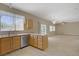 Cozy kitchen featuring granite countertops and stainless steel appliances at 8913 Loggers Mill Ave, Las Vegas, NV 89143