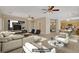 Bright and airy living room featuring an open floor plan and stylish furniture at 8913 Loggers Mill Ave, Las Vegas, NV 89143