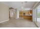 Bright open floor plan showcases kitchen, dining, and living areas at 8913 Loggers Mill Ave, Las Vegas, NV 89143