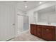 Bathroom features double sinks, walk-in shower, and updated fixtures at 9198 Harbin Ave, Las Vegas, NV 89148