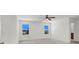 Spacious bedroom with ceiling fan and plenty of natural light at 9198 Harbin Ave, Las Vegas, NV 89148