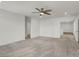 Large primary bedroom features neutral colors, fan and carpet at 9198 Harbin Ave, Las Vegas, NV 89148