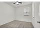 A room with carpet, a fan and a window at 9198 Harbin Ave, Las Vegas, NV 89148