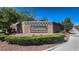 A welcoming stone sign with lush landscaping marks the entrance to the Lianna community at 9198 Harbin Ave, Las Vegas, NV 89148