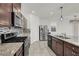 Beautiful kitchen with granite counters, stainless steel appliances, and ample cabinet space at 9198 Harbin Ave, Las Vegas, NV 89148