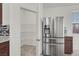 Walk-in pantry with shelving near stainless steel refrigerator at 9198 Harbin Ave, Las Vegas, NV 89148