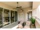 Spacious balcony with ceiling fan and seating area overlooking common area at 9201 Tesoras Dr # 302, Las Vegas, NV 89144