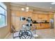Open-concept dining area with stainless steel appliances and ample cabinet space at 9201 Tesoras Dr # 302, Las Vegas, NV 89144