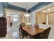 Elegant dining room with coffered ceiling and modern light fixture, perfect for gatherings at 9201 Tesoras Dr # 302, Las Vegas, NV 89144
