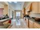 Eat-in kitchen with granite countertops, stainless appliances, and access to dining area at 9201 Tesoras Dr # 302, Las Vegas, NV 89144