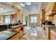 Eat-in kitchen with granite countertops, stainless appliances, and access to dining area at 9201 Tesoras Dr # 302, Las Vegas, NV 89144