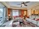 Relaxing living room with balcony, access to kitchen and a splash of style with accent wall at 9201 Tesoras Dr # 302, Las Vegas, NV 89144