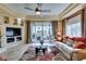 Living room with recessed lighting and balcony, creating a bright and inviting living space at 9201 Tesoras Dr # 302, Las Vegas, NV 89144