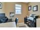 Functional office space with natural light and neutral color palette, ready for productivity at 9201 Tesoras Dr # 302, Las Vegas, NV 89144