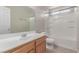Bright bathroom with modern fixtures and a combined shower and bathtub at 9537 Michelle Falls Ave, Las Vegas, NV 89149