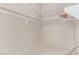 Walk-in closet featuring wire rack shelving and carpet floors at 9537 Michelle Falls Ave, Las Vegas, NV 89149